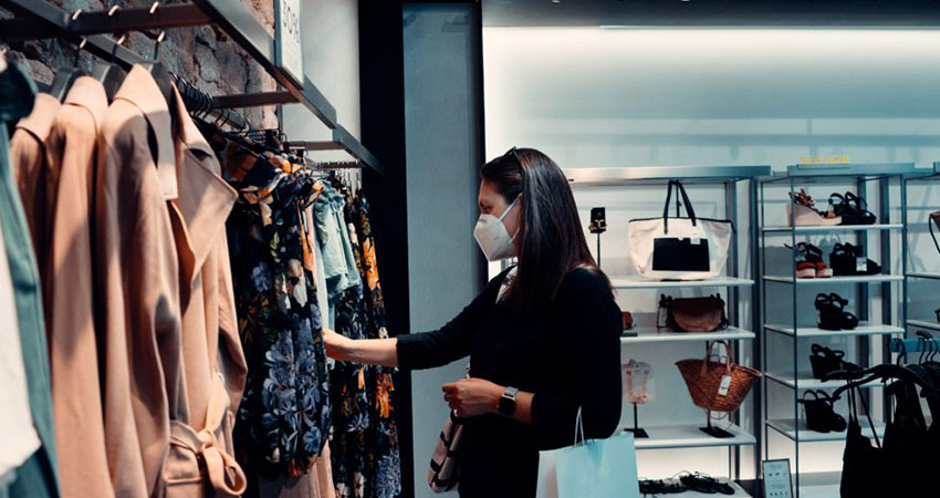 retailers masked woman shopper