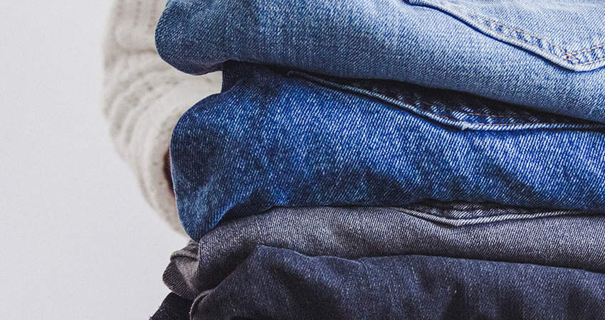 ecommerce returns pile of jeans feature