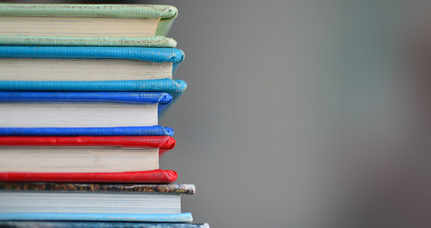 back-to-school stack of books feature